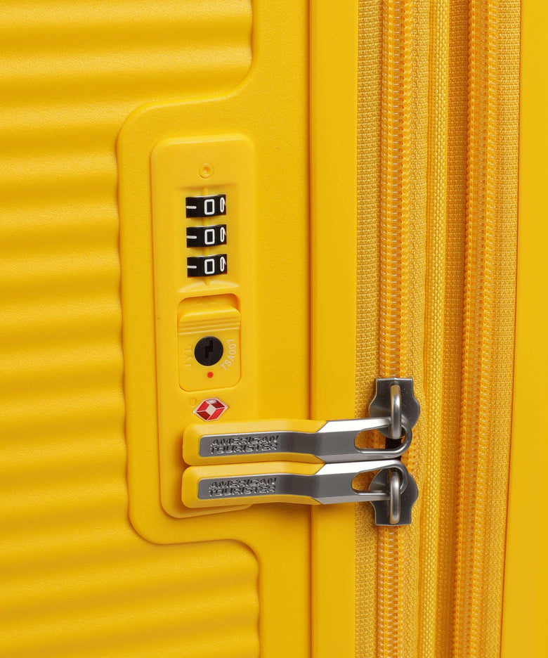 American Tourister Soundbox Spinner (4 wheels) golden yellow